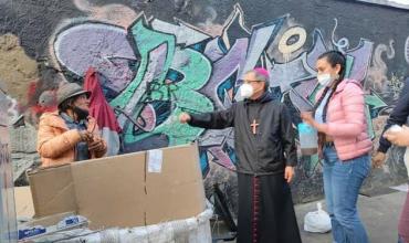 Arzobispo y habitantes de calle